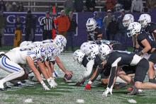 (TC GORDON | THE GRAHAM LEADER) The Graham Steers’ defense lines up against the Brock Eagles’ offense Friday, Dec. 6 in the Region 1-4A Division II final. The game was a battle, but the Eagles won in triple overtime 12-10 to end the Steers’ season.