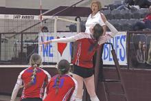 (TC GORDON | THE GRAHAM LEADER) Senior Emi Gordy jumps into the air and looks to make contact with the ball for a kill Thursday, Nov. 7 during Graham’s 3-0 loss to Decatur in the area round of the playoffs.