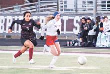 (MIKE WILLIAMS | THE GRAHAM LEADER) Madi Wilde beats a Sissies defender on a run during the second half of a 0-0 tie Wednesday, Jan. 25 at Bridgeport. The Lady Blues endured several shots in the closing minutes of the match to end in the tie.