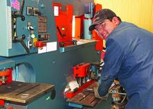 Dual credit welding student Saul Hernandez arrives early to class to help prep metal at North Central Texas College’s Graham. (Photo courtesy Elizabeth Deiter, NCTC)