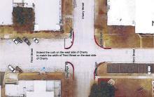 (CITY OF GRAHAM | CONTRIBUTED PHOTO) An aerial shot of the intersection of Third Street and Cherry Street with a rough sketch of curb that is extended out from the west side of Cherry Street. The city is considering extending the curb and adding four stop signs to the intersection.