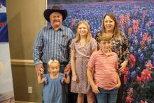 (CONTRIBUTED PHOTO | PCHAS) Amy and Gary Moore with their three children (from left to right) Hadlee, Brooklyn and Brayden. On Friday, Oct. 14, the couple received the Foster Parents of the Year award from the Texas Council of Child Welfare Boards.