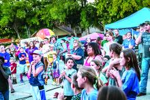 Patrons at last year’s Open Door Christian School Fall Fest gather to watch an activity during the event. This year’s Fall Fest is Saturday, Oct. 8. Courtesy photo by LeAnn Stetson