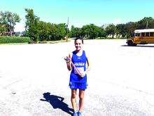 Khloe Morris led all of Graham’s varsity runners with her second-place individual finish at the Graham Invitation Cross Country meet at the Graham Country Club. 