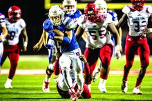 Graham running back Jaxon Brockway powered his way to 140 rushing yards and three touchdowns in Graham’s 28-0 win over Hirschi Friday night at Newton Field. Leader photo by David Flynn