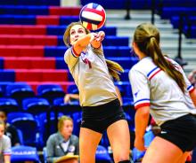 Baylee Loomis finished with four blocks in the Blues’ win over Windthorst Tuesday. Loomis, Emily Davis (pictured) and Skylar Morris each had four blocks in the win, and Loomis led the team with four aces.  Leader photo by David Flynn