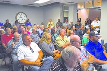 Crowds of Graham residents filled the Visitor and Business Center to voice their concerns over the recent higher water bill prices that began in July. 