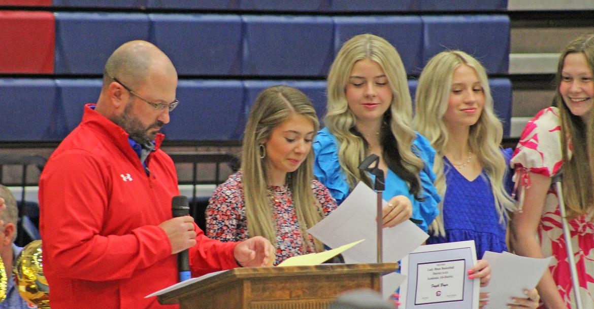 (TC GORDON | THE GRAHAM LEADER) Head girls basketball coach Kyle Wood speaks about his team before presenting awards during the GHS spring sports banquet held Tuesday, May 14. Athletes from all winter and spring sports were honored for their efforts this year.