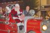 (THOMAS WALLNER | THE GRAHAM LEADER) Graham Fire Department leads the parade with Santa during the 2021 Graham Chamber of Commerce lighted Christmas parade on the Graham downtown square. The parade this year will be held be held at 7 p.m. Thursday, Dec. 1.